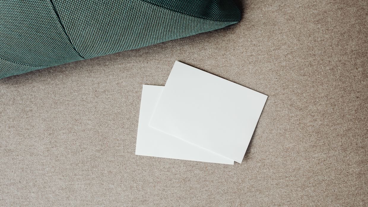 One plain index card on a surface.