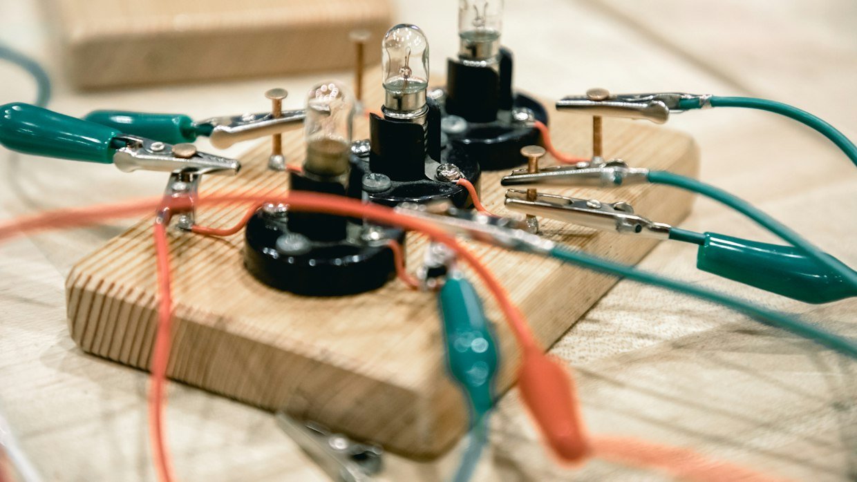A simple mechanical switch on a panel.