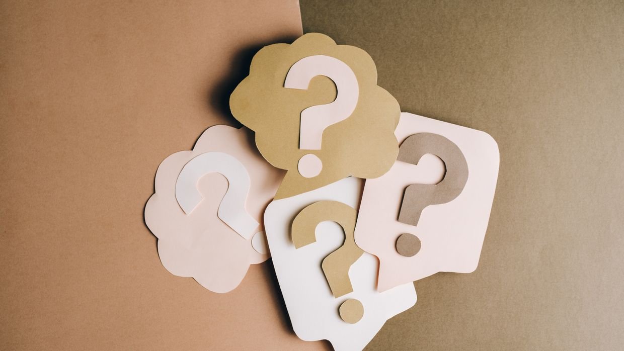 Large printed punctuation marks.