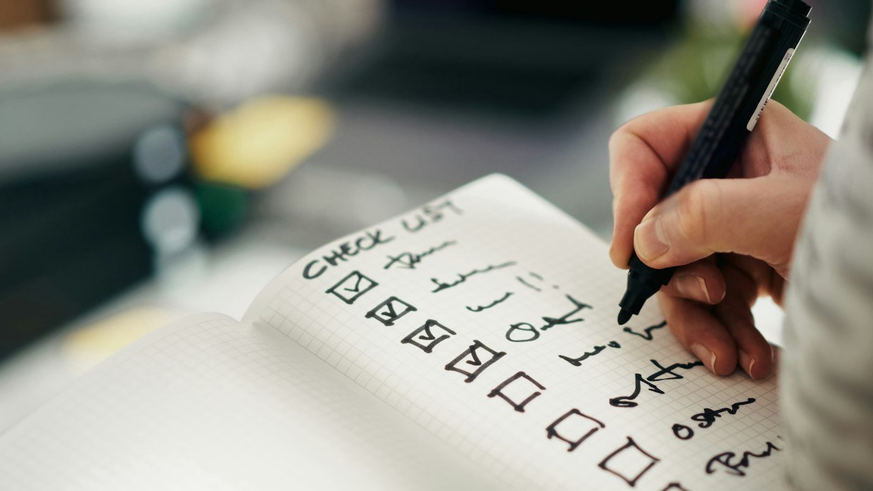 A checklist on a clipboard, for which videos qualify for automatic chapters.