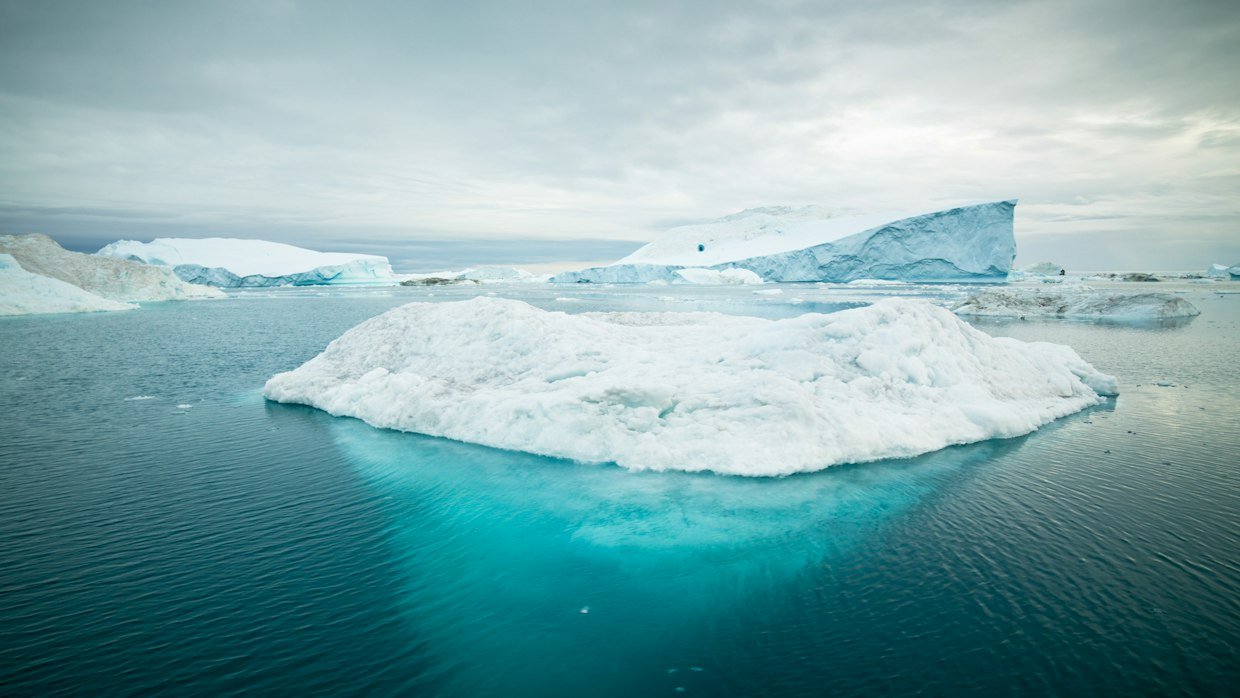 An iceberg with most of its mass below the waterline.