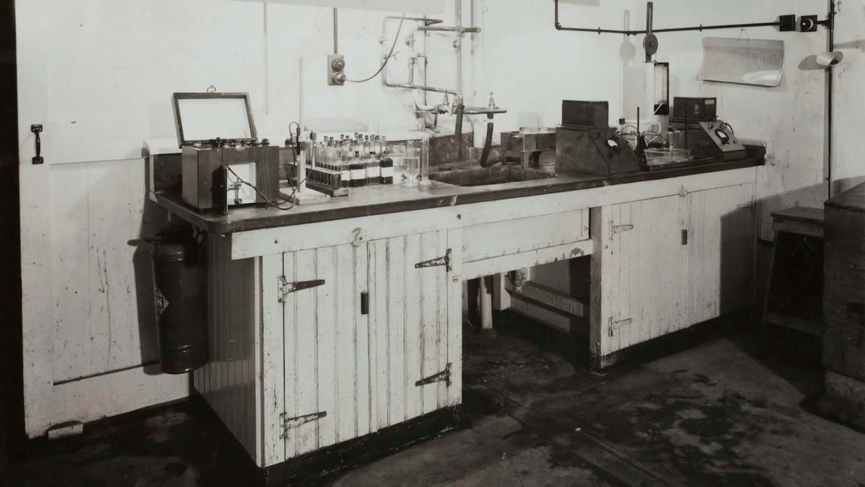 Testing equipment laid out on a laboratory bench.