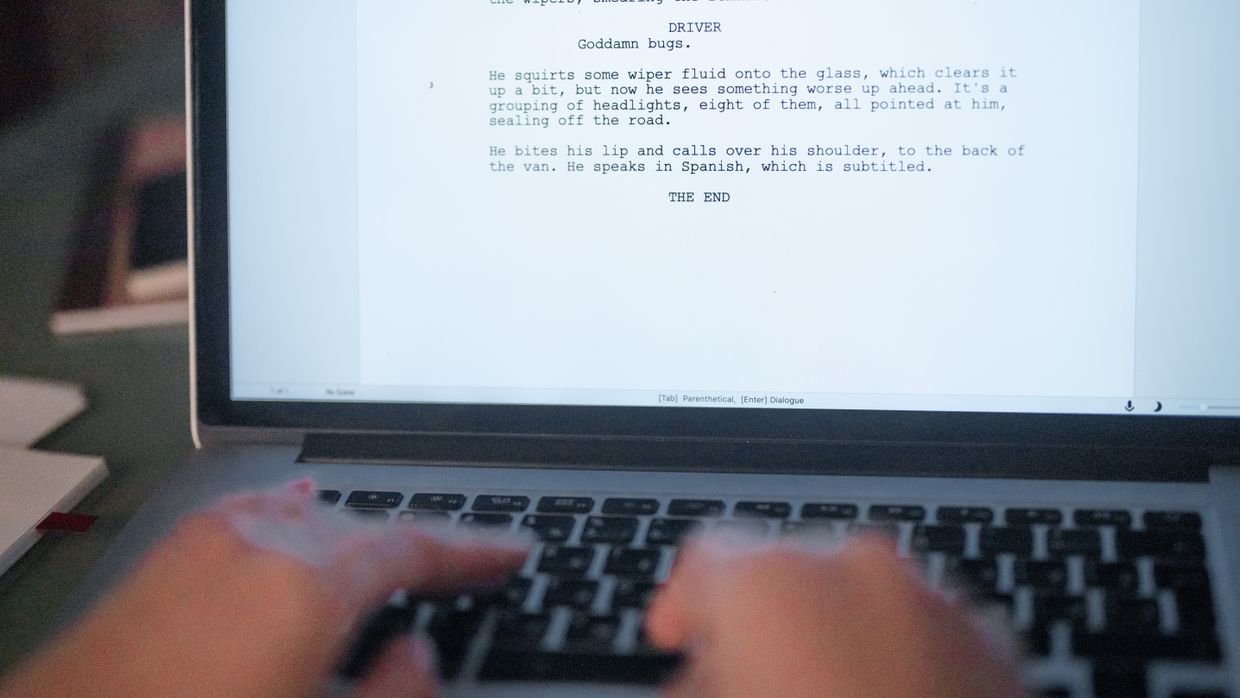 A laptop screen showing a long column of text, like YouTube’s transcript panel.