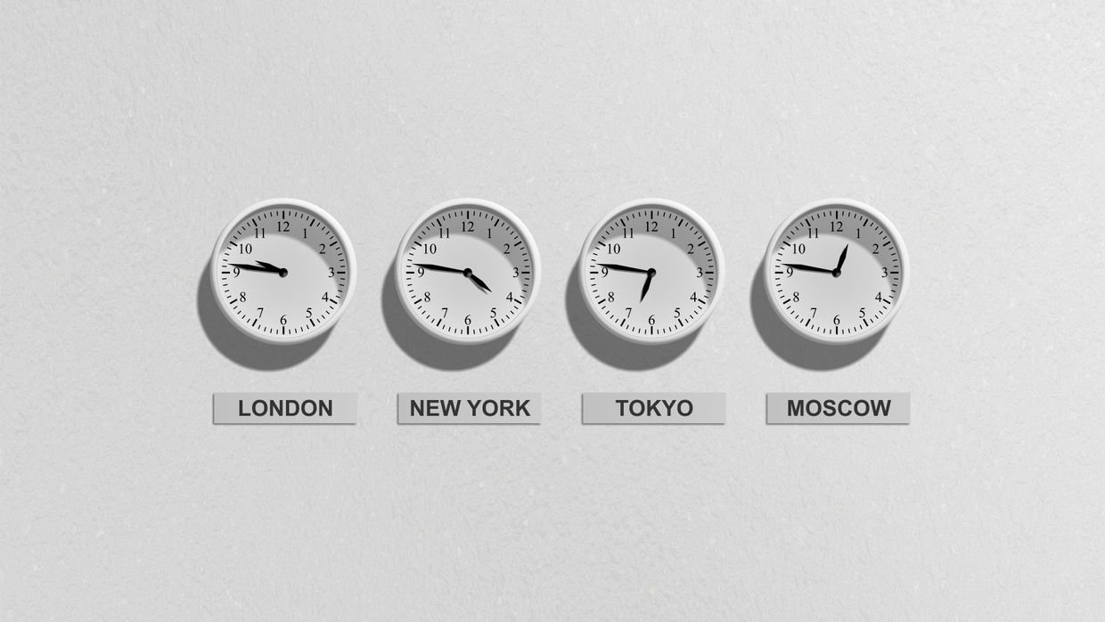 Two clocks side by side showing different times.
