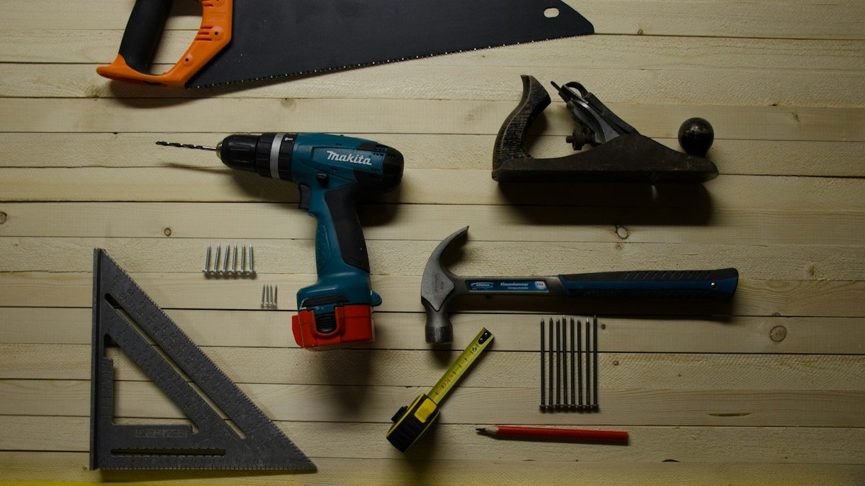 Two different tools laid side by side.