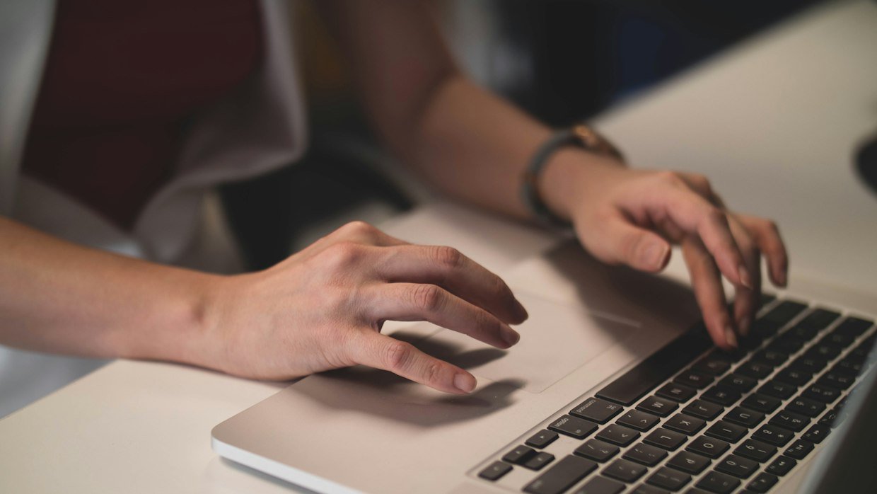 Hands on a keyboard, copying a video transcript into a chat window.