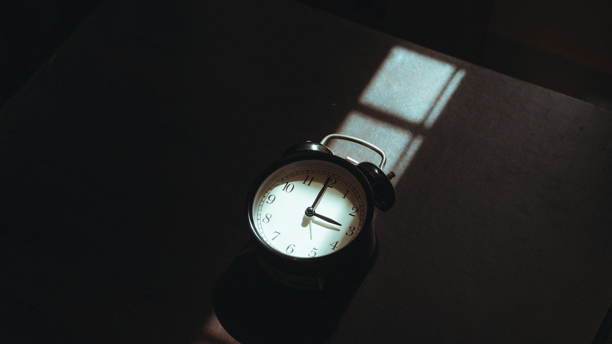 A stopwatch resting on a desk.