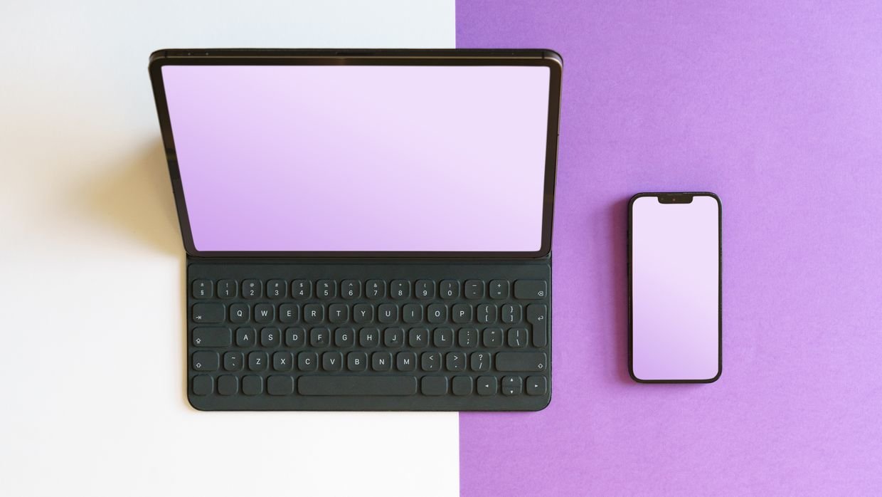 A laptop showing two windows side by side, like a video with an assistant panel next to it.
