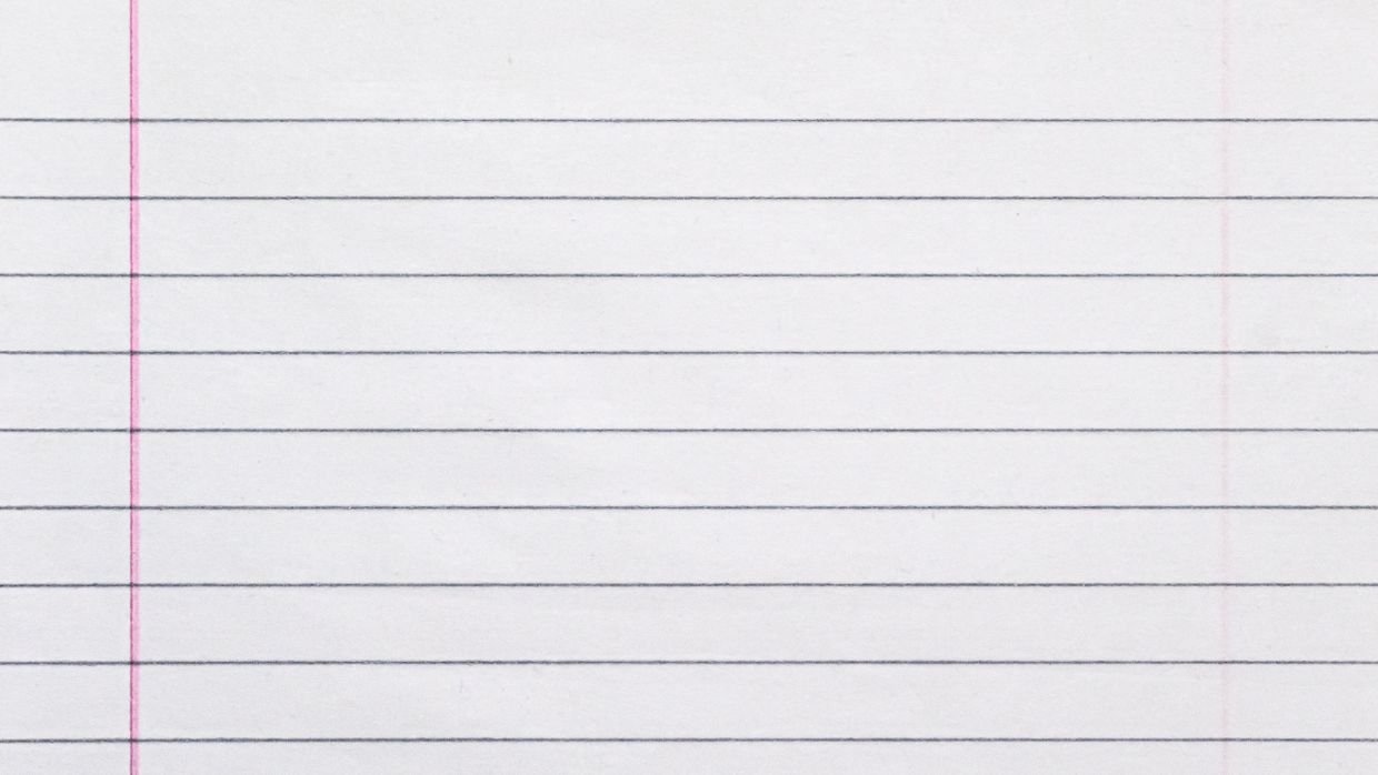 A ruled notebook page with a pen, like the cue column and notes area of a Cornell page.