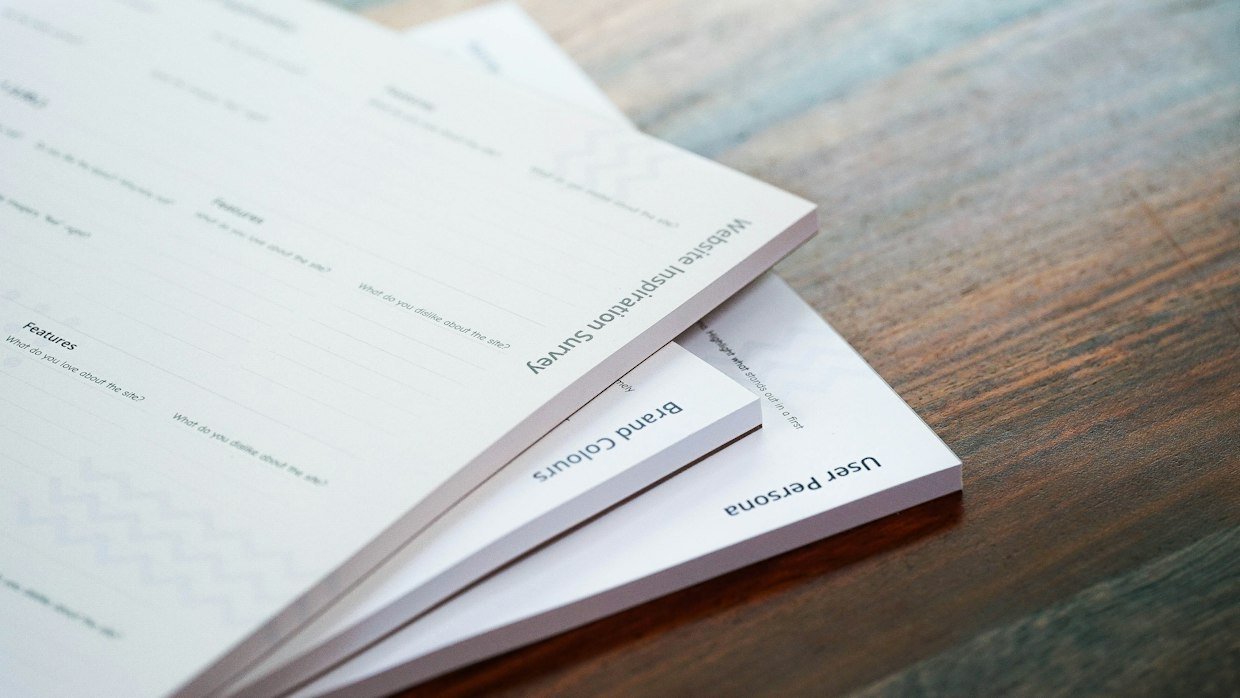 Two identical printed documents side by side.