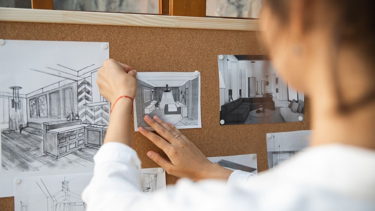 Storyboard sketches pinned to a board.