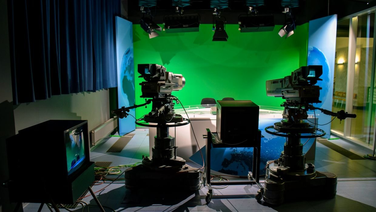 An empty news studio, where post-debate coverage adds a commentator’s interpretation.