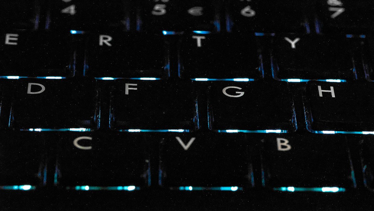 Keyboard keys close up, for the paste shortcut that decides whether Markdown gets formatted.