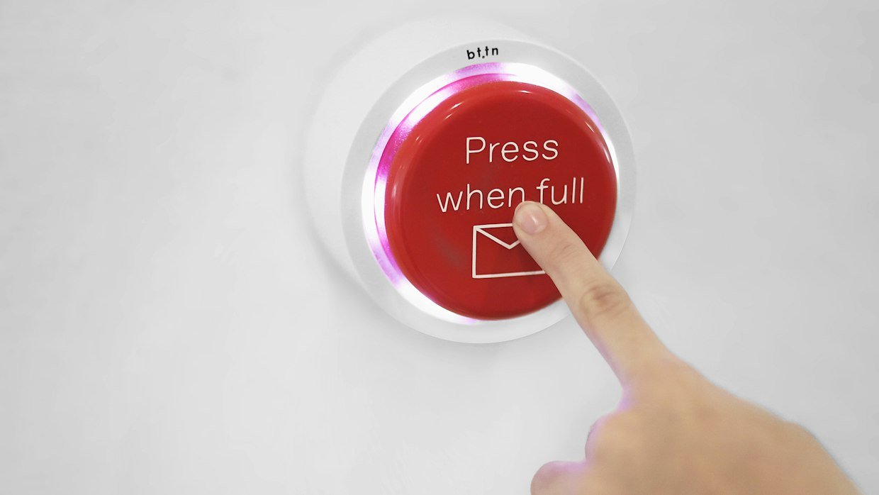 A finger pressing a button.