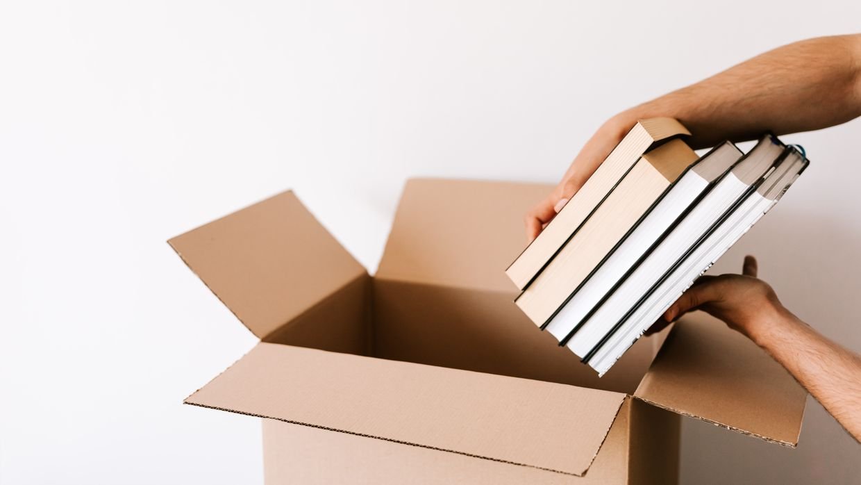 Items packed carefully into a box.