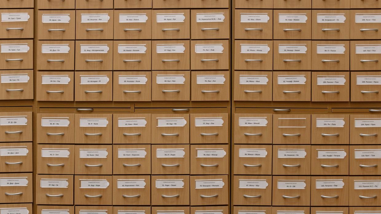 An open drawer of a card catalogue.