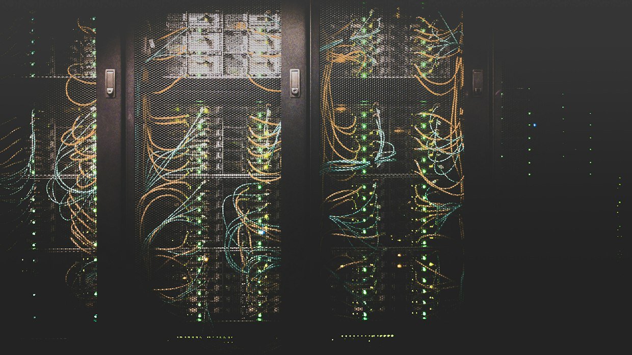 Rows of server racks in a data centre.