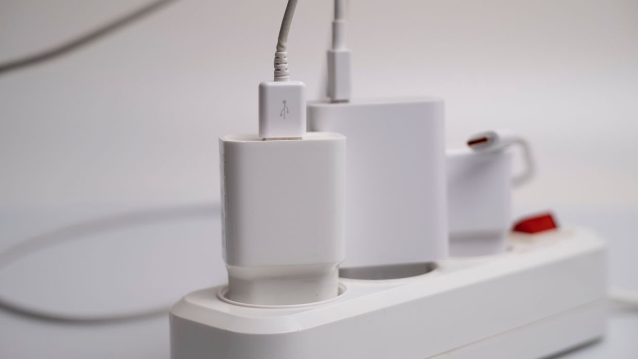 A socket with several plug adapters.