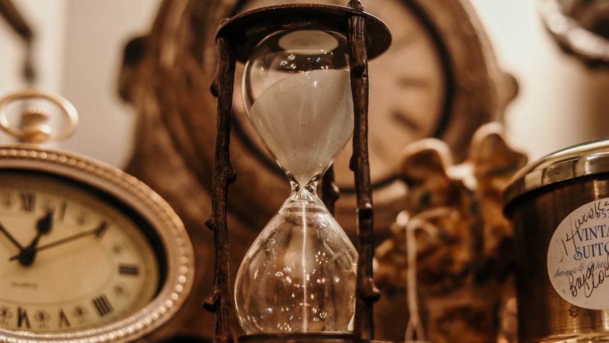 Sand running through an hourglass.