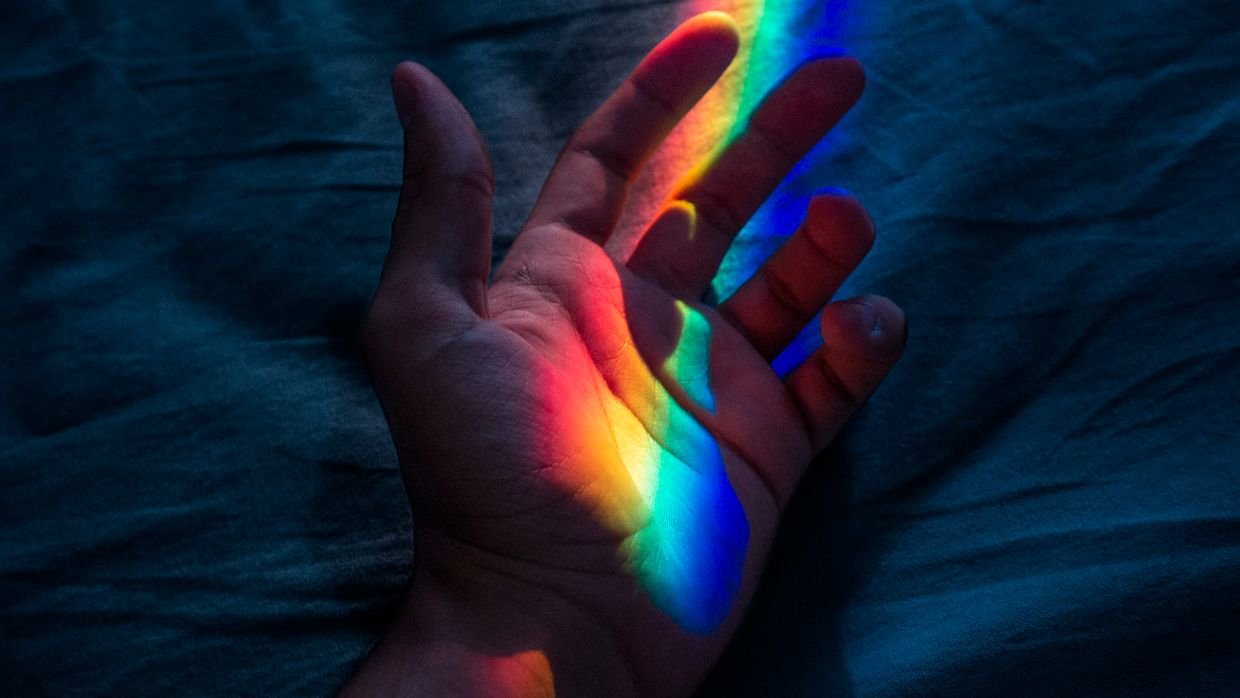 A prism splitting a beam of light.