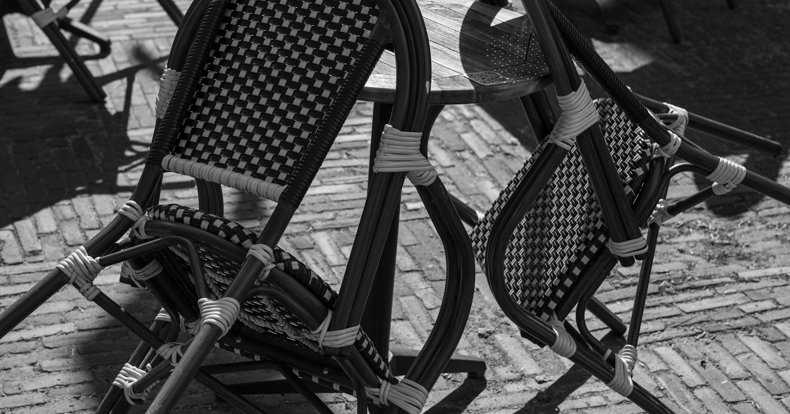 Two chairs facing each other with microphones between them.