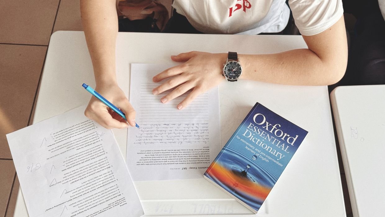English study materials on a desk, since English learners are who the free tier suits today.