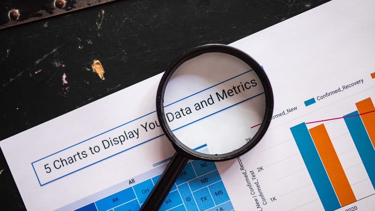 A magnifying glass over a document, for reading each tool’s published claims carefully.