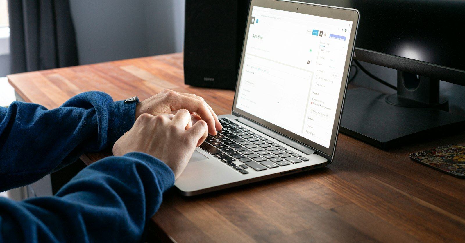 A student studying at a laptop, for Mindgrasp’s study platform next to a plain YouTube summarizer.