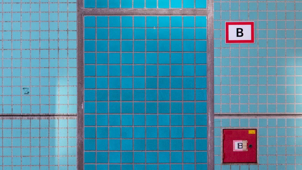 A neat grid of tiles on a wall.