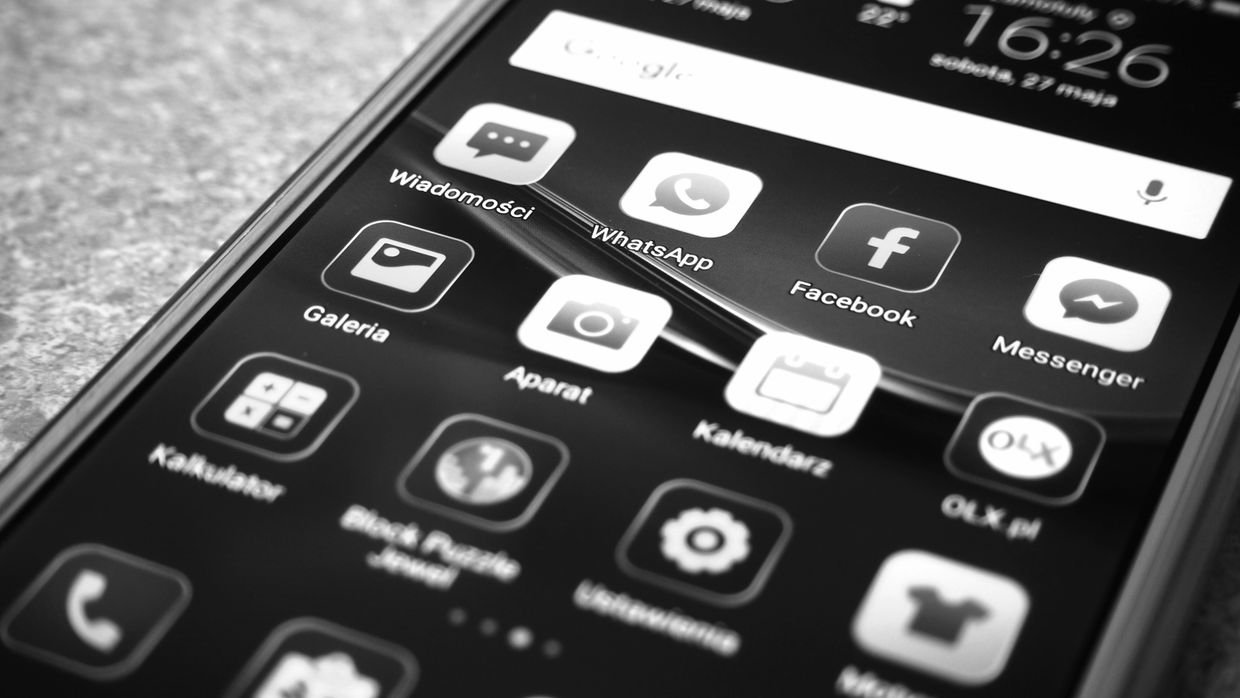A phone home screen showing app icons.