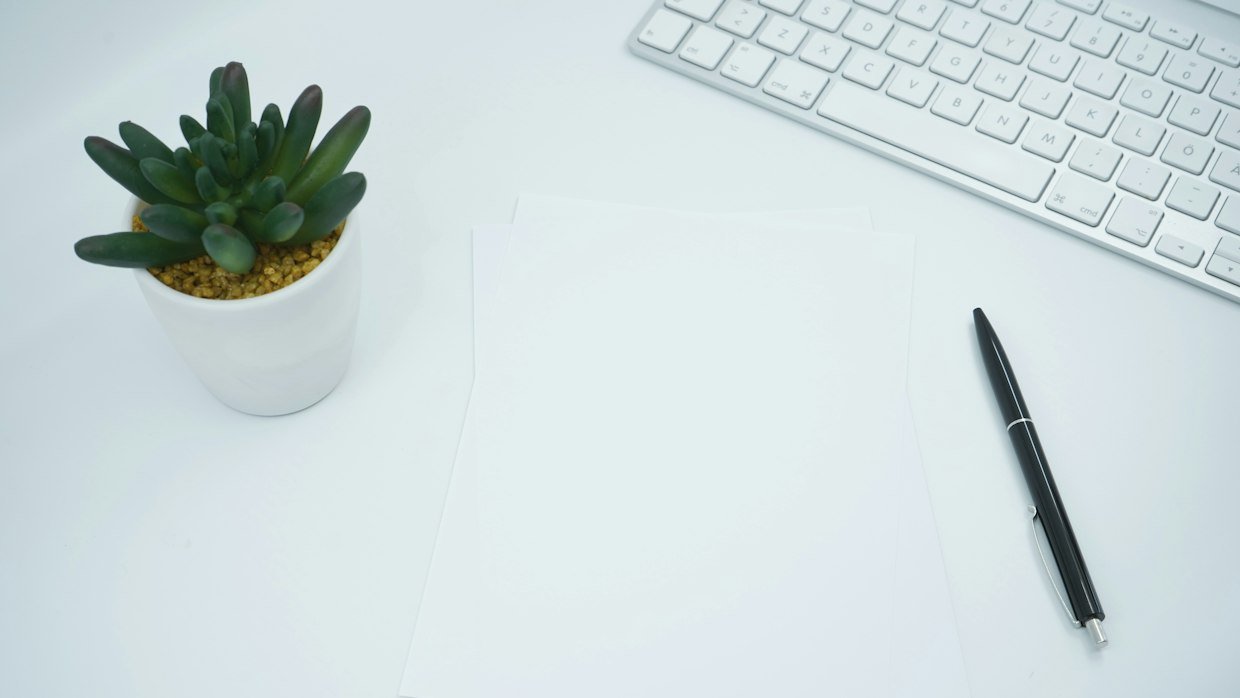 A blank sheet of paper on a desk.