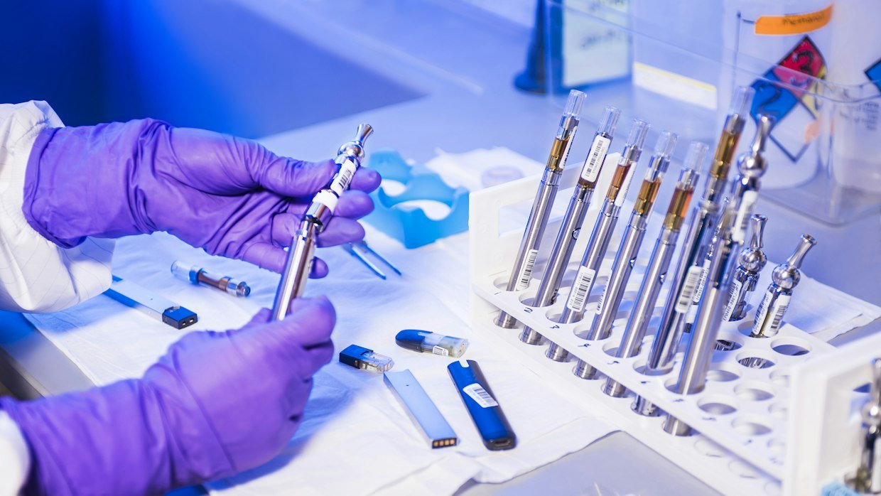 Test tubes lined up in a rack.