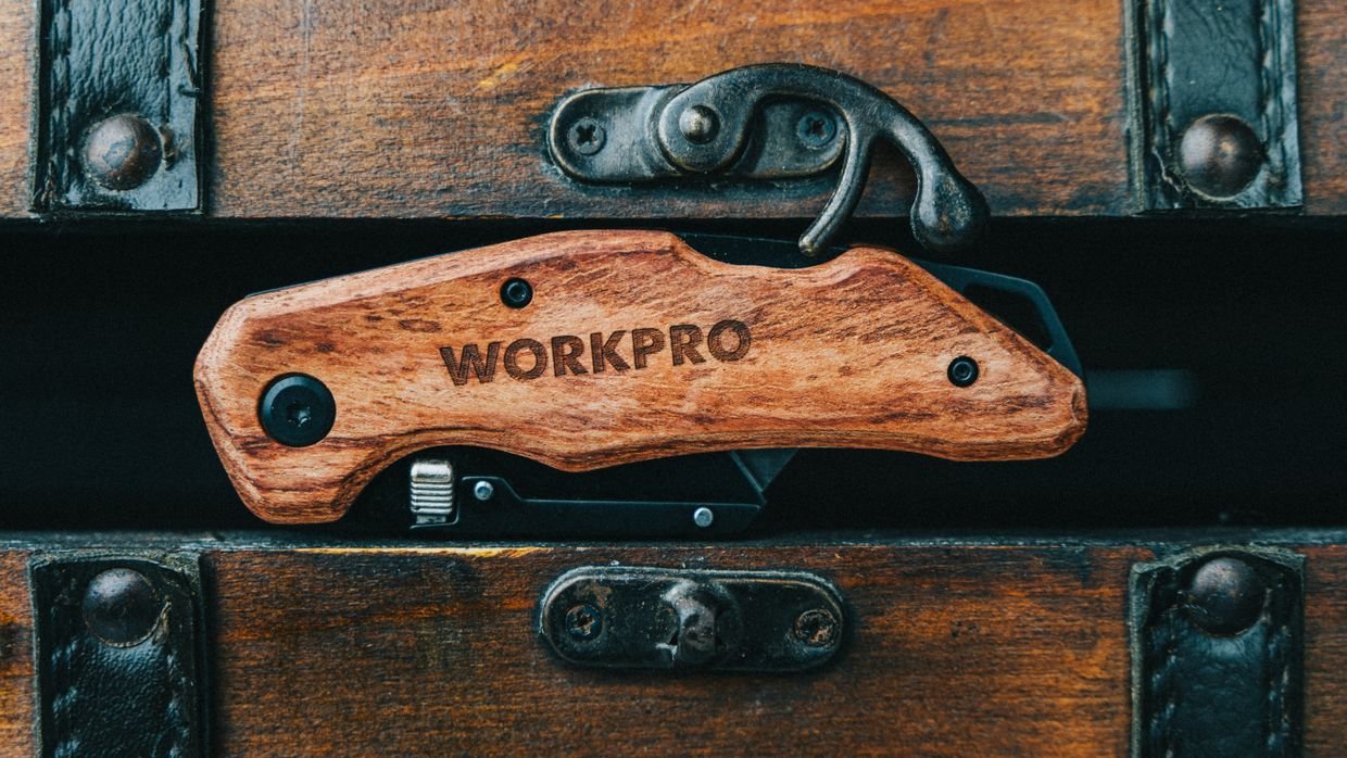 A multi-tool knife opened on a table.