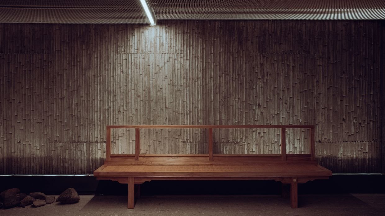 One tool lying on an empty bench.