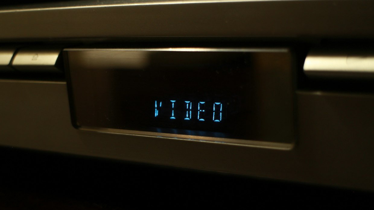 Video player controls up close, where the closed captions button shows whether captions exist.