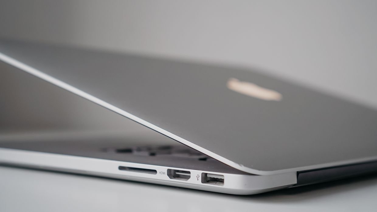 A closed laptop on a desk.