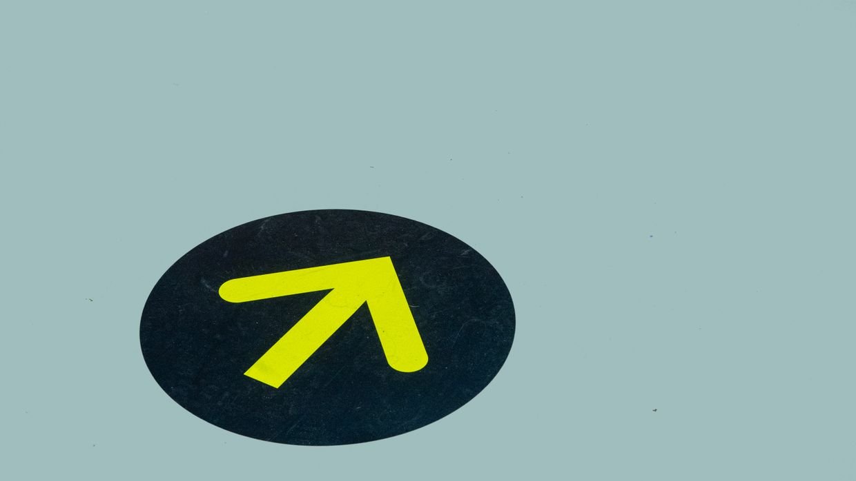 A remote control with a fast forward button.