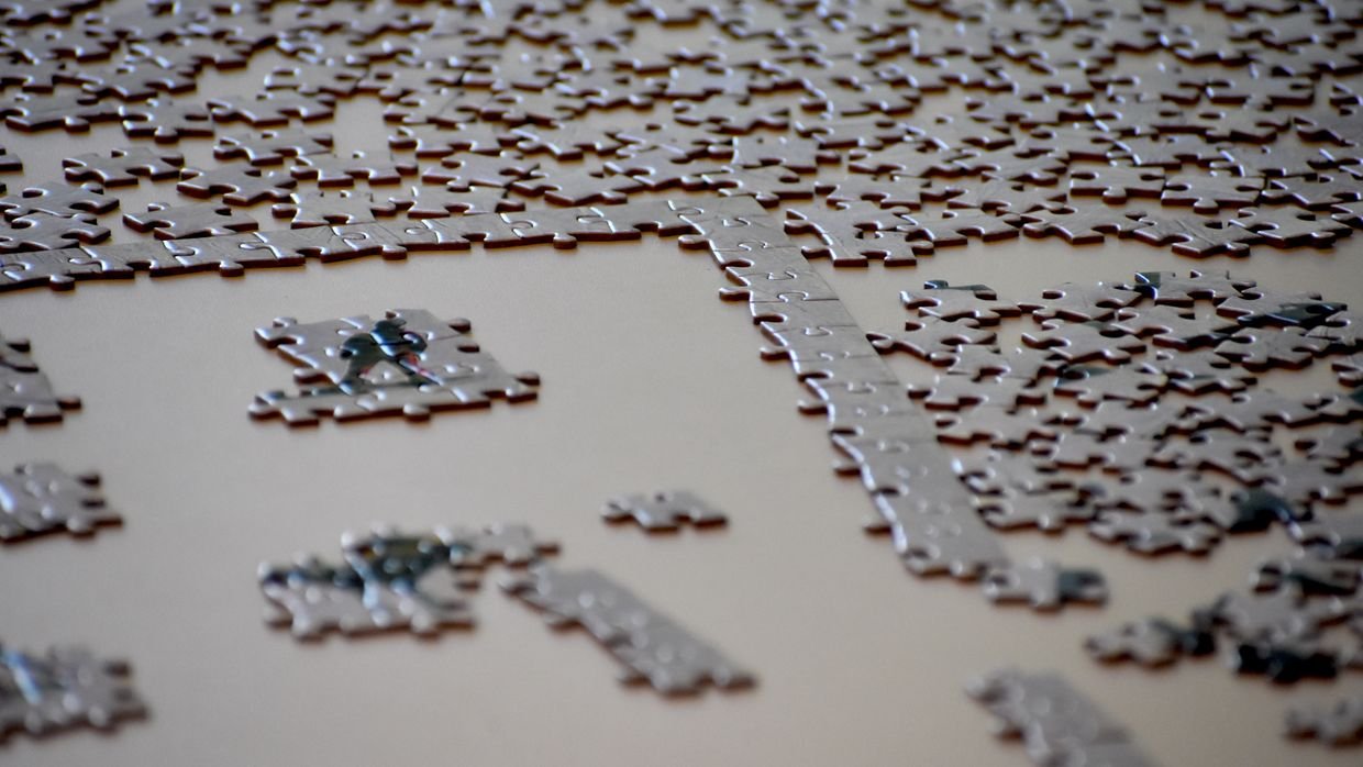 A jigsaw puzzle left half finished.