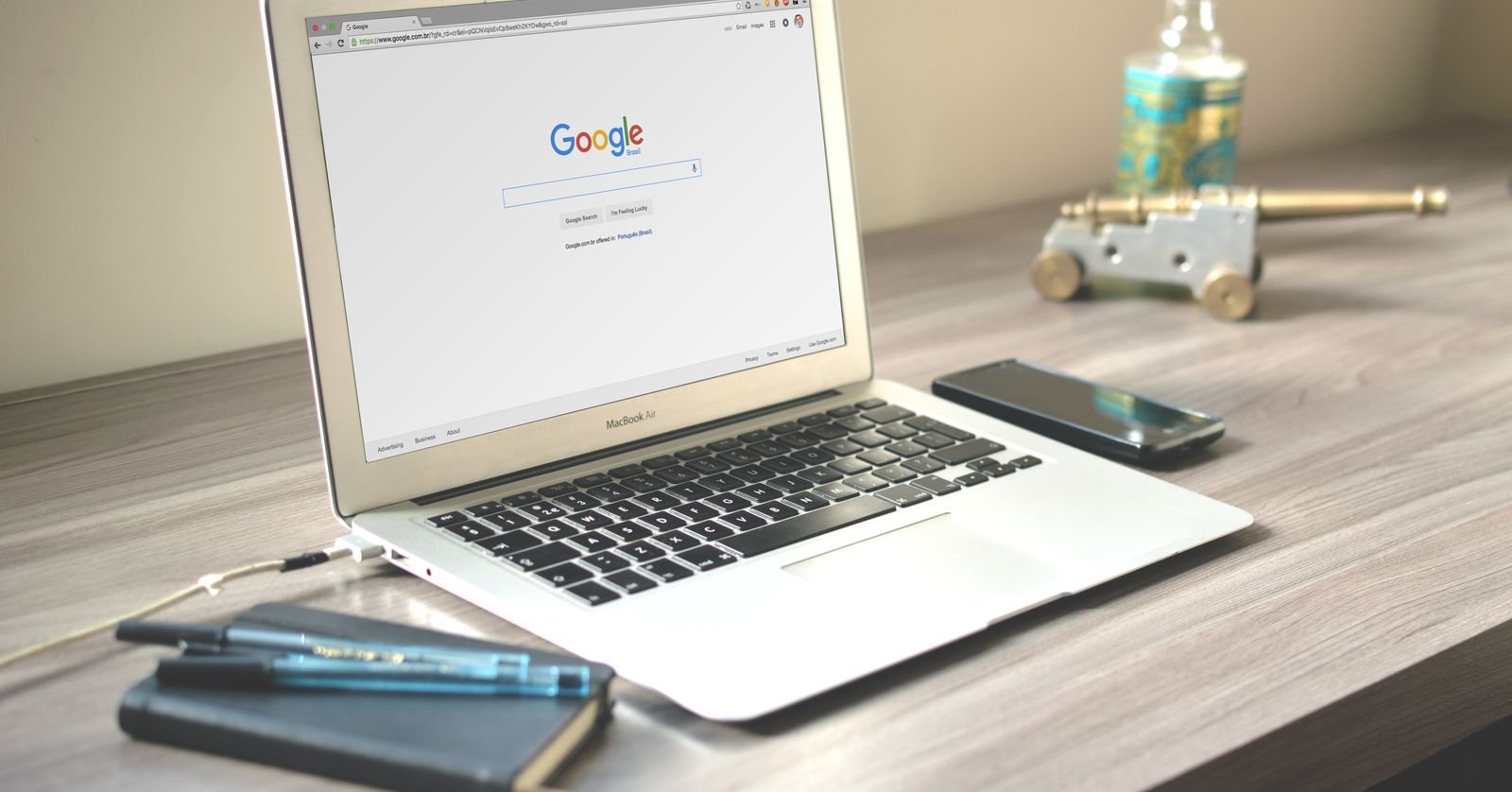 A laptop with a browser window open on a desk, for summarizing YouTube videos with Opera AI.