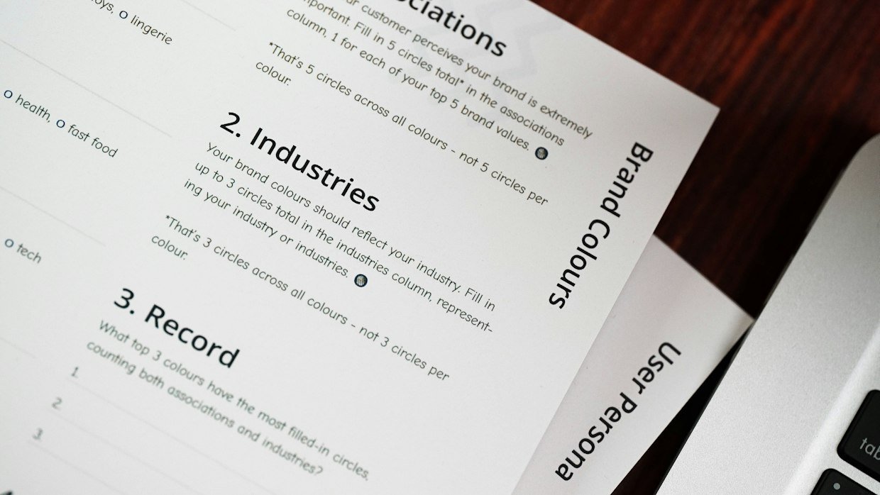 Printed pages of text on a desk, standing in for a transcript pasted in as a fallback.