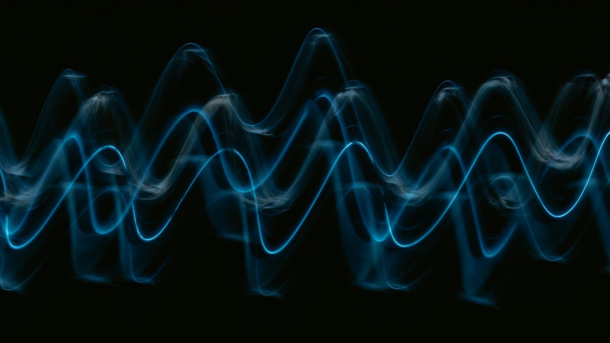 An audio waveform running the length of a timeline.