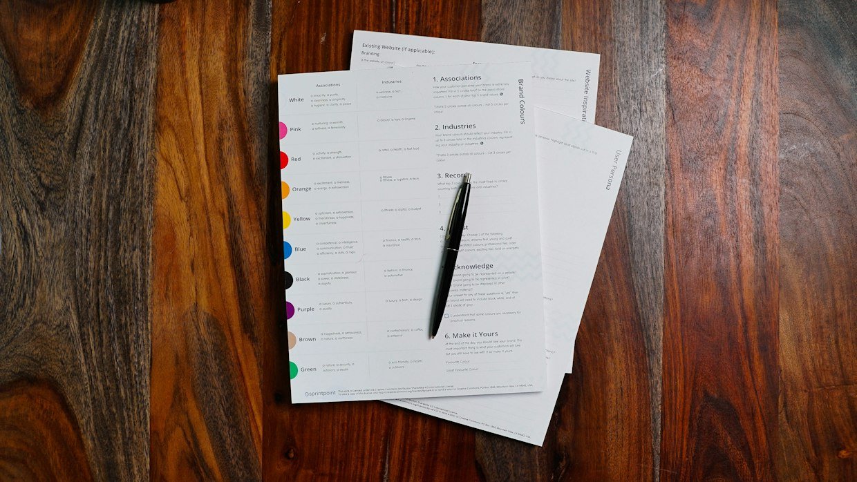A blank registration form on a desk.