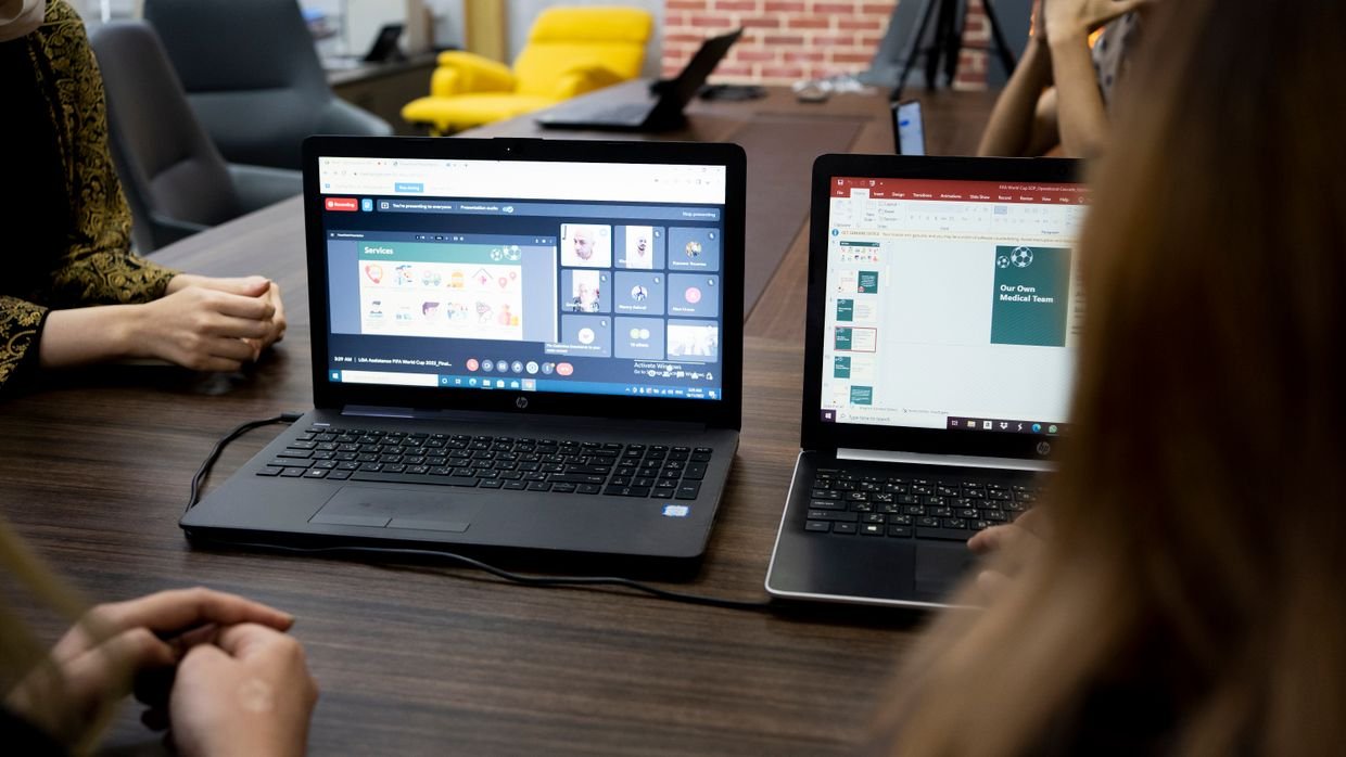 A laptop playing a video beside its text, like Reader’s time-synced transcript view.