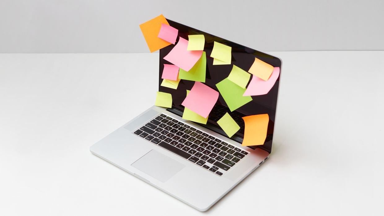 A sticky note on a laptop, for a one-off summary that does not need a library.
