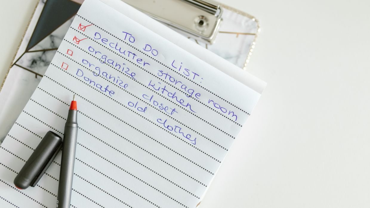 A bulleted list held on a clipboard.