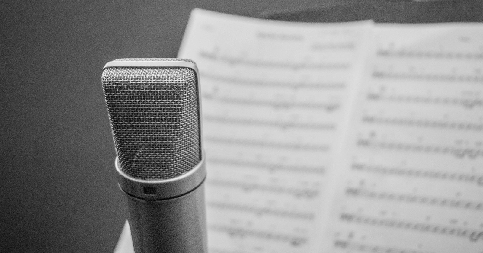 A microphone beside an open notebook.