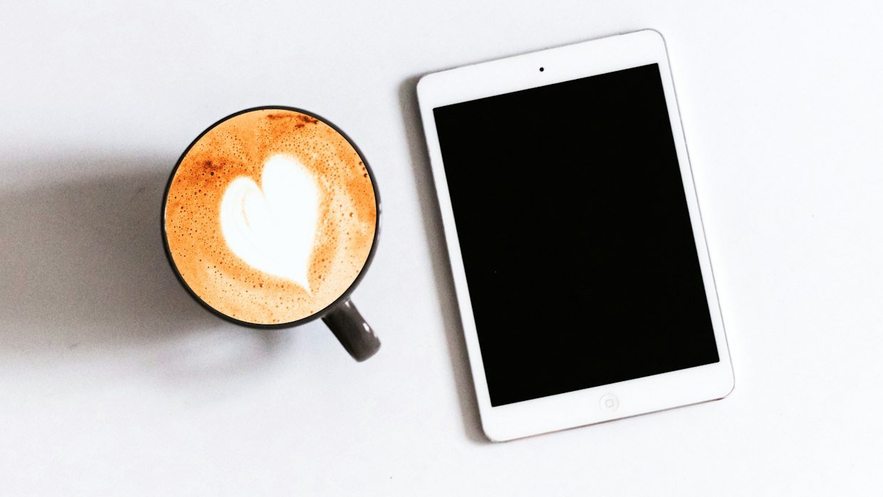 Someone reading news on a tablet, where a summary is often all you need.