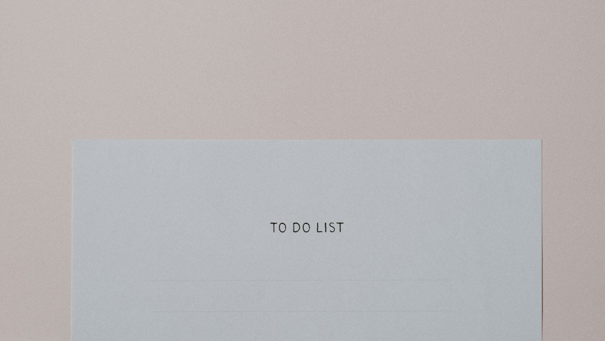 A shortlist written on a notepad.