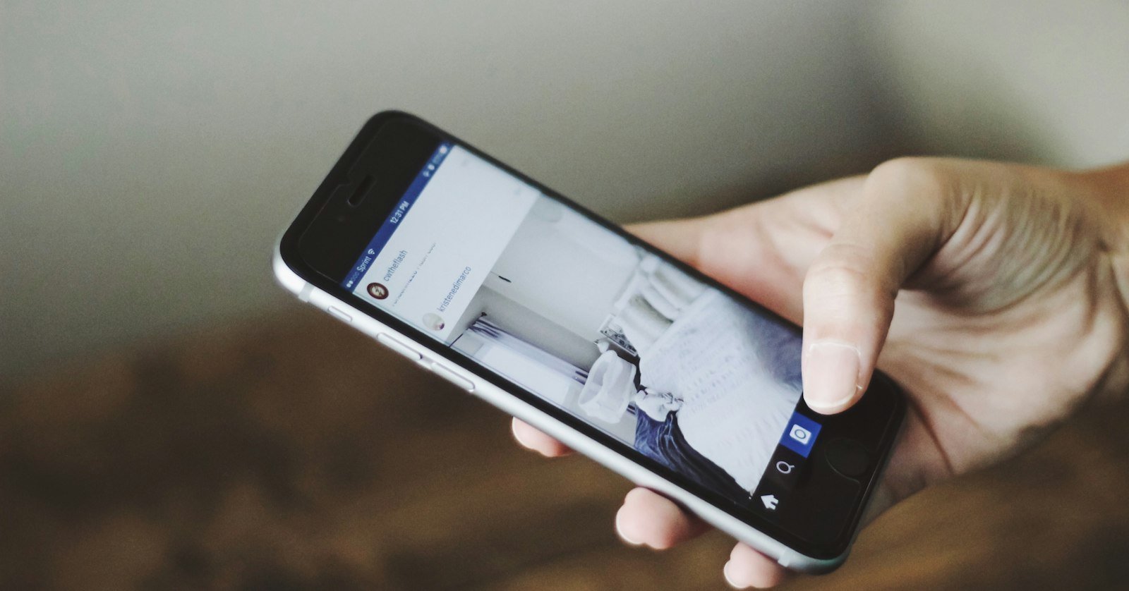 A phone held upright playing a video.