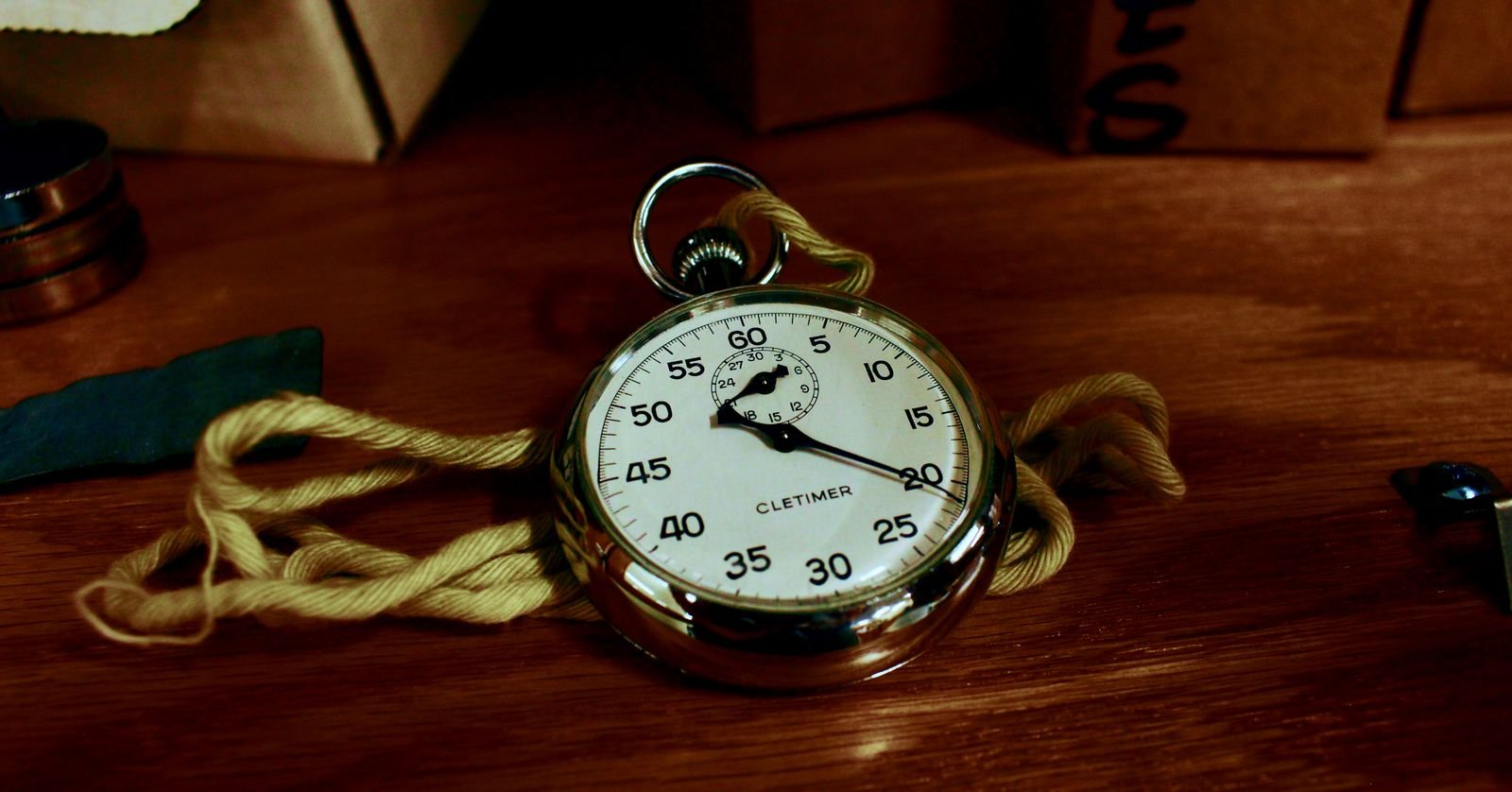 A stopwatch resting on a page of notes.